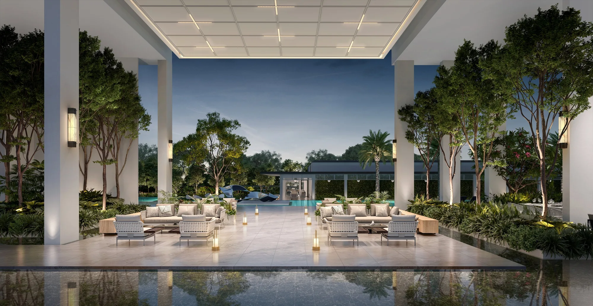 Bloomsbury Residences, artist&rsquo;s impression: a covered poolside lounge beneath the blocks in the evening, with sofas and lanterns around a reflecting pool and the gardens beyond
